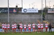 26 April 2023; Derry players stand for Amhrán na bhFiann before the 2023 EirGrid Ulster U20 Football Championship Final match between Derry and Down at BOX-IT Athletic Grounds in Armagh. Photo by Ben McShane/Sportsfile