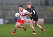 26 April 2023; Patrick O'Kane of Derry in action against Tiarnan Ryan of Down during the 2023 EirGrid Ulster U20 Football Championship Final match between Derry and Down at BOX-IT Athletic Grounds in Armagh. Photo by Ben McShane/Sportsfile