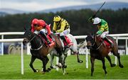 27 April 2023; Klassical Dream, left, with Paul Townend up, on their way to winning the Ladbrokes Champion Stayers Hurdle, from second place Asterion Forlonge, yellow and black cap, with Patrick Mullins up, and third place Sire Du Berlais, with Mark Walsh up, during day three of the Punchestown Festival at Punchestown Racecourse in Kildare. Photo by Seb Daly/Sportsfile
