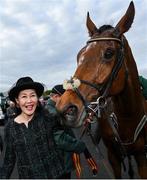 27 April 2023; Sein Chew, wife of owner Isaac Souede, celebrates with El Fabiolo after the Barberstown Castle Novice Steeplechase during day three of the Punchestown Festival at Punchestown Racecourse in Kildare. Photo by Seb Daly/Sportsfile