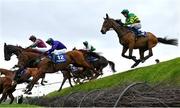 27 April 2023; Midnight Maestro, right, with Derek O'Connor up, jumps Ruby's Double during the Mongey Communications La Touche Cup Cross Country Steeplechase on day three of the Punchestown Festival at Punchestown Racecourse in Kildare. Photo by Seb Daly/Sportsfile