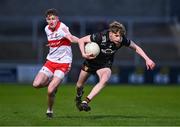 26 April 2023; Patrick McCarthy of Down and Peter McCullagh of Derry during the 2023 EirGrid Ulster U20 Football Championship Final match between Derry and Down at BOX-IT Athletic Grounds in Armagh. Photo by Ben McShane/Sportsfile