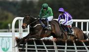 28 April 2023; Impaire Et Passe, left, with Paul Townend up, jumps the last on their way to winning the Alanna Homes Champion Novice Hurdle, from second place High Definition, right, with JJ Slevin up, during day four of the Punchestown Festival at Punchestown Racecourse in Kildare. Photo by Seb Daly/Sportsfile