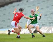 28 April 2023; Shane O'Brien of Limerick in action against James Dwyer of Cork during the oneills.com Munster GAA Hurling U20 Championship Round 5 match between Limerick and Cork at TUS Gaelic Grounds in Limerick. Photo by Stephen Marken/Sportsfile