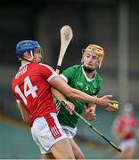 28 April 2023; Colin Walsh of Cork in action against David Fitzgerald of Limerick during the oneills.com Munster GAA Hurling U20 Championship Round 5 match between Limerick and Cork at TUS Gaelic Grounds in Limerick. Photo by Stephen Marken/Sportsfile