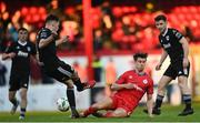 28 April 2023; Cian Coleman of Cork City is tackled by Matty Smith of Shelbourne during the SSE Airtricity Men's Premier Division match between Shelbourne and Cork City at Tolka Park in Dublin. Photo by Harry Murphy/Sportsfile