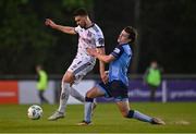28 April 2023; Krystian Nowak of Bohemians in action against Danú Bishop Kinsella of UCD during the SSE Airtricity Men's Premier Division match between UCD and Bohemians at the UCD Bowl in Dublin. Photo by Ben McShane/Sportsfile