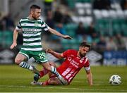28 April 2023; Jack Byrne of Shamrock Rovers is tackled by Greg Bolger of Sligo Rovers during the SSE Airtricity Men's Premier Division match between Shamrock Rovers and Sligo Rovers at Tallaght Stadium in Dublin. Photo by Tyler Miller/Sportsfile