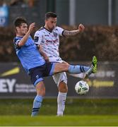 28 April 2023; John O’Sullivan of Bohemians in action against Donal Higgins of UCD during the SSE Airtricity Men's Premier Division match between UCD and Bohemians at the UCD Bowl in Dublin. Photo by Ben McShane/Sportsfile