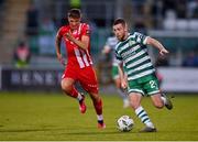28 April 2023; Jack Byrne of Shamrock Rovers in action against Kailin Barlow of Sligo Rovers during the SSE Airtricity Men's Premier Division match between Shamrock Rovers and Sligo Rovers at Tallaght Stadium in Dublin. Photo by Tyler Miller/Sportsfile
