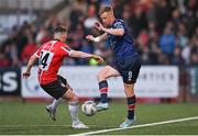 28 April 2023; Eoin Doyle of St Patrick's Athletic in action against Ben Doherty of Derry City during the SSE Airtricity Men's Premier Division match between Derry City and St Patrick's Athletic at The Ryan McBride Brandywell Stadium in Derry. Photo by Ramsey Cardy/Sportsfile