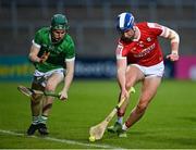 28 April 2023; Ben O'Connor of Cork in action against Seán O'Neill of Limerick during the oneills.com Munster GAA Hurling U20 Championship Round 5 match between Limerick and Cork at TUS Gaelic Grounds in Limerick. Photo by Stephen Marken/Sportsfile