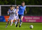 28 April 2023; Alex Nolan of UCD in action against Paddy Kirk of Bohemians during the SSE Airtricity Men's Premier Division match between UCD and Bohemians at the UCD Bowl in Dublin. Photo by Ben McShane/Sportsfile