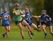 29 April 2023; Niamh Cox of Carlow in action against Kaylee O'Keefe of Laois during the Electric Ireland Camogie Minor B All-Ireland Championship Semi-Final match between Carlow and Laois at Banagher in Offaly. Photo by Tom Beary/Sportsfile