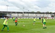 29 April 2023; St Michael's AFC players warm-up before the FAI Junior Cup Final match between St Michael’s AFC and Newmarket Celtic at Jackman Park in Limerick. Photo by Seb Daly/Sportsfile