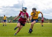 29 April 2023; Anya Boyle of Westmeath in action against Mairéad Lohan of Roscommon during the Electric Ireland Camogie Minor B All-Ireland Championship Semi Final match between Roscommon and Westmeath at Templeport St. Aidan’s in Corrasmongan, Cavan. Photo by Stephen Marken/Sportsfile