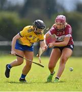 29 April 2023; Lilly Murray of Roscommon in action against Kate Whyte of Westmeath during the Electric Ireland Camogie Minor B All-Ireland Championship Semi Final match between Roscommon and Westmeath at Templeport St. Aidan’s in Corrasmongan, Cavan. Photo by Stephen Marken/Sportsfile