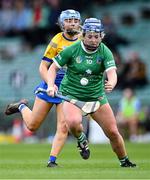 29 April 2023; Caoimhe Lyons of Limerick in action against Caoimhe Carmody of Clare during the Munster Senior Camogie Championship Quarter-Final match between Limerick and Clare at TUS Gaelic Grounds in Limerick. Photo by Piaras Ó Mídheach/Sportsfile