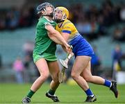 29 April 2023; Clare Hehir of Clare in action against Lizanna Boylan of Limerick during the Munster Senior Camogie Championship Quarter-Final match between Limerick and Clare at TUS Gaelic Grounds in Limerick. Photo by Piaras Ó Mídheach/Sportsfile