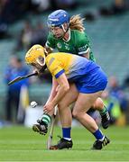 29 April 2023; Caoimhe Lyons of Limerick in action against Clare Hehir of Clare during the Munster Senior Camogie Championship Quarter-Final match between Limerick and Clare at TUS Gaelic Grounds in Limerick. Photo by Piaras Ó Mídheach/Sportsfile
