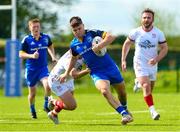 29 April 2023; Robbie Vallejo of Leinster is tackled by Gerard Treanor of Ulster during an Interprovincial Juniors match between Leinster and Ulster at Tullow RFC in Tullow, Carlow. Photo by Matt Browne/Sportsfile