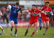 29 April 2023; Darren Hughes of Monaghan in action against Niall Loughlin of Derry during the Ulster GAA Football Senior Championship Semi Final match between Derry and Monaghan at O’Neills Healy Park in Omagh, Tyrone. Photo by Ben McShane/Sportsfile