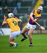 29 April 2023; Oisin Foley of Wexford in action against Sean Elliott of Antrim during the Leinster GAA Hurling Senior Championship Round 2 match between Wexford and Antrim at Chadwicks Wexford Park in Wexford. Photo by Tyler Miller/Sportsfile