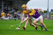 29 April 2023; Rory O'Connor of Wexford in action against Niall O'Connor of Antrim during the Leinster GAA Hurling Senior Championship Round 2 match between Wexford and Antrim at Chadwicks Wexford Park in Wexford. Photo by Tyler Miller/Sportsfile