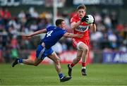 29 April 2023; Brendan Rogers of Derry in action against Ryan Wylie of Monaghan during the Ulster GAA Football Senior Championship Semi Final match between Derry and Monaghan at O’Neills Healy Park in Omagh, Tyrone. Photo by Ben McShane/Sportsfile