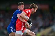 29 April 2023; Brendan Rogers of Derry in action against Karl O'Connell of Monaghan during the Ulster GAA Football Senior Championship Semi Final match between Derry and Monaghan at O’Neills Healy Park in Omagh, Tyrone. Photo by Ben McShane/Sportsfile
