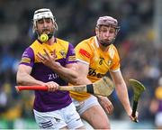 29 April 2023; Oisin Foley of Wexford in action against Eoghan Campbell of Antrim during the Leinster GAA Hurling Senior Championship Round 2 match between Wexford and Antrim at Chadwicks Wexford Park in Wexford. Photo by Tyler Miller/Sportsfile