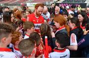 29 April 2023; Conor Glass of Derry with supporters after the Ulster GAA Football Senior Championship Semi Final match between Derry and Monaghan at O’Neills Healy Park in Omagh, Tyrone. Photo by Ben McShane/Sportsfile