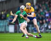 29 April 2023; Kyle Hayes of Limerick in action against David Fitzgerald of Clare during the Munster GAA Hurling Senior Championship Round 2 match between Limerick and Clare at TUS Gaelic Grounds in Limerick. Photo by Piaras Ó Mídheach/Sportsfile