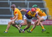 29 April 2023; Lee Chin of Wexford in action against Eoghan Campbell of Antrim, left, and Paul Boyle during the Leinster GAA Hurling Senior Championship Round 2 match between Wexford and Antrim at Chadwicks Wexford Park in Wexford. Photo by Tyler Miller/Sportsfile