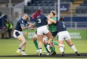 29 April 2023; Sam Monaghan of Ireland is tackled by Leah Bartlett of Scotland during the TikTok Women's Six Nations Rugby Championship match between Scotland and Ireland at DAM Health Stadium in Edinburgh, Scotland. Photo by Paul Devlin/Sportsfile