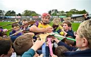 29 April 2023; Lee Chin of Wexford signs autographs after the Leinster GAA Hurling Senior Championship Round 2 match between Wexford and Antrim at Chadwicks Wexford Park in Wexford. Photo by Tyler Miller/Sportsfile