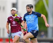 29 April 2023; Danny Sutcliffe of Dublin races clear of Robbie Greville of Westmeath during the Leinster GAA Hurling Senior Championship Round 2 match between Dublin and Westmeath at Parnell Park in Dublin. Photo by Ray McManus/Sportsfile