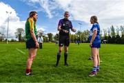 29 April 2023; Referee Eamon Cassidy with Carlow Captain Holly Wall Murphy, left, and Laois Captain Tara Lowry before the Electric Ireland Camogie Minor B All-Ireland Championship Semi-Final match between Carlow and Laois at Banagher in Offaly. Photo by Tom Beary/Sportsfile