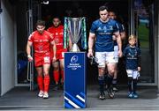 29 April 2023; Captains Antoine Dupont of Toulouse and James Ryan of Leinster, with matchday mascot Con Cullen, walk out before the Heineken Champions Cup Semi-Final match between Leinster and Toulouse at the Aviva Stadium in Dublin. Photo by Harry Murphy/Sportsfile