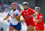 30 April 2023; Saoirse McCarthy of Cork in action against Clodagh Carroll of Waterford during the Munster Senior Camogie Championship Quarter Final match between Cork and Waterford at Páirc Uí Chaoimh in Cork. Photo by Brendan Moran/Sportsfile