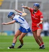 30 April 2023; Niamh Curran of Waterford in action against Orla Cronin of Cork during the Munster Senior Camogie Championship Quarter Final match between Cork and Waterford at Páirc Uí Chaoimh in Cork. Photo by Brendan Moran/Sportsfile