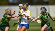 30 April 2023; Aine Byrne of Wicklow in action against Kathryn Ryan, left, and Ciara O'Sullivan of Kerry during the Electric Ireland Camogie Minor C All-Ireland Championship Semi Final match between Kerry and Wicklow at St. Flannan's Park in Moneygall, Tipperary. Photo by Tom Beary/Sportsfile