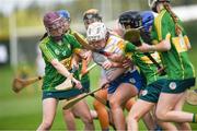 30 April 2023; Poppie Rose Cullen Dunne of Wicklow in action against Amy O’Loughlin, left, and Yen Leniston of Kerry during the Electric Ireland Camogie Minor C All-Ireland Championship Semi Final match between Kerry and Wicklow at St. Flannan's Park in Moneygall, Tipperary. Photo by Tom Beary/Sportsfile