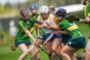 30 April 2023; Poppie Rose Cullen Dunne of Wicklow in action against Amy O’Loughlin, left, and Yen Leniston of Kerry during the Electric Ireland Camogie Minor C All-Ireland Championship Semi Final match between Kerry and Wicklow at St. Flannan's Park in Moneygall, Tipperary. Photo by Tom Beary/Sportsfile
