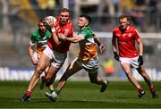 30 April 2023; Conor Grimes of Louth in action against Ruairi McNamee of Offaly during the Leinster GAA Football Senior Championship Semi Final match between Louth and Offaly at Croke Park in Dublin. Photo by Ben McShane/Sportsfile