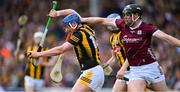 30 April 2023; John Donnelly of Kilkenny is tackled by Joseph Cooney of Galway during the Leinster GAA Hurling Senior Championship Round 2 match between Kilkenny and Galway at UPMC Nowlan Park in Kilkenny. Photo by Ray McManus/Sportsfile