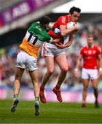 30 April 2023; Tommy Durnin of Louth in action against Ruairi McNamee of Offaly during the Leinster GAA Football Senior Championship Semi Final match between Louth and Offaly at Croke Park in Dublin. Photo by Ben McShane/Sportsfile