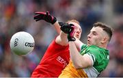 30 April 2023; Cian Farrell of Offaly in action against Donal McKenny of Louth during the Leinster GAA Football Senior Championship Semi Final match between Louth and Offaly at Croke Park in Dublin. Photo by Seb Daly/Sportsfile