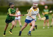 30 April 2023; Ciara Connolly of Wicklow in action against Yen Leniston of Kerry during the Electric Ireland Camogie Minor C All-Ireland Championship Semi Final match between Kerry and Wicklow at St. Flannan's Park in Moneygall, Tipperary. Photo by Tom Beary/Sportsfile