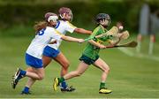 30 April 2023; Yen Leniston of Kerry in action against Ciara Connolly, left, Ciara Wafer of Wicklow during the Electric Ireland Camogie Minor C All-Ireland Championship Semi Final match between Kerry and Wicklow at St. Flannan's Park in Moneygall, Tipperary. Photo by Tom Beary/Sportsfile